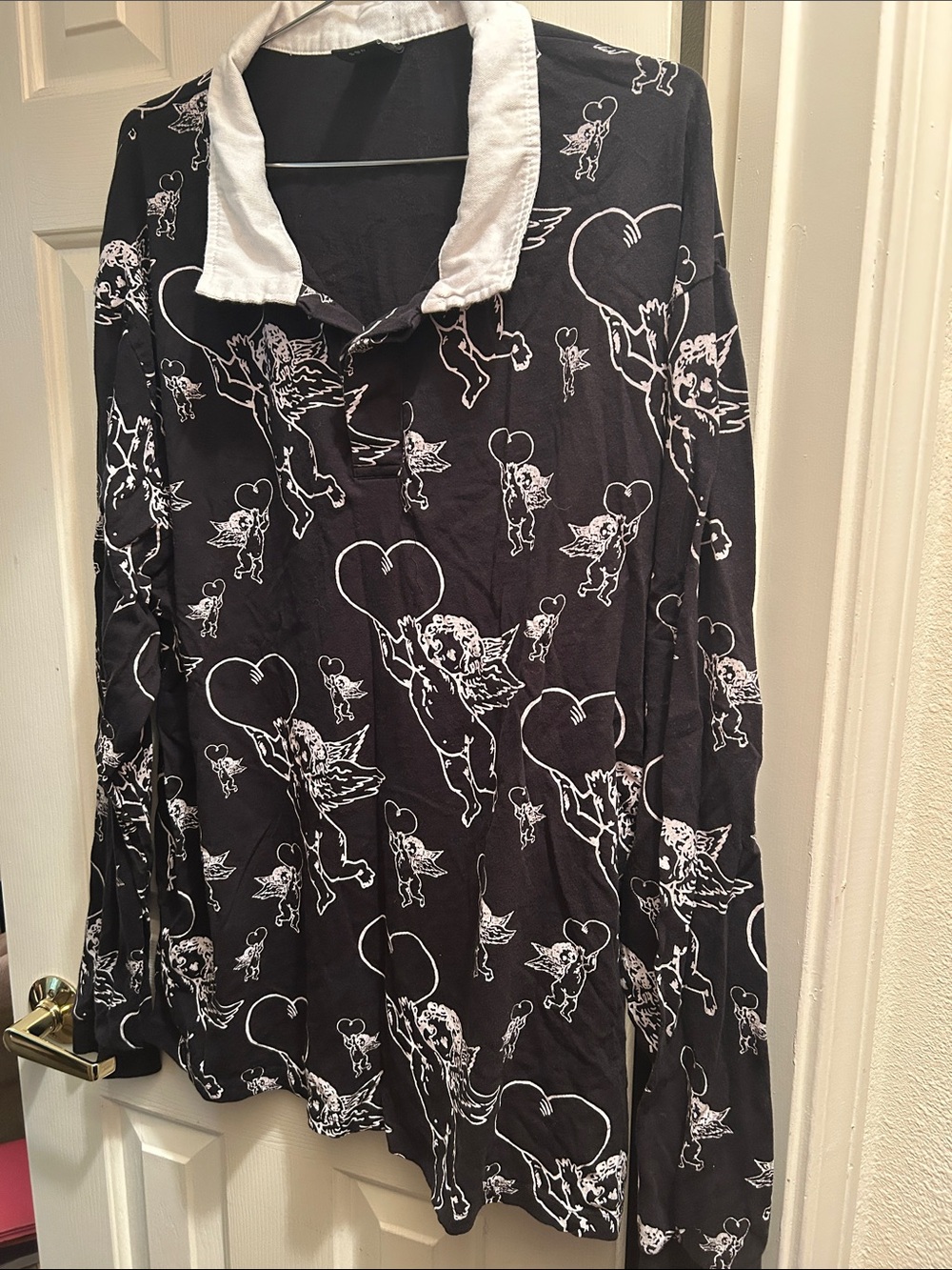 3/10$ Urban Outfitters Black Shirt with White Cherub Print